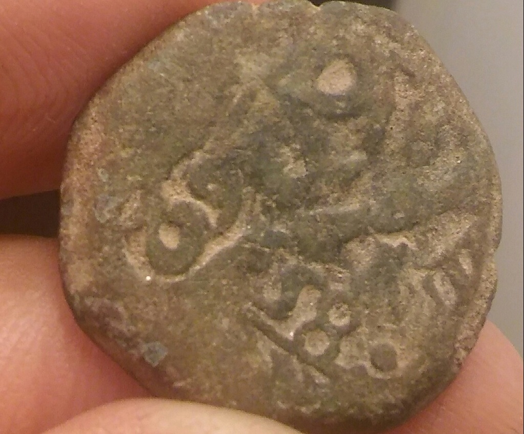 Moneda con patina superr antigua con numero de telefono 20170911
