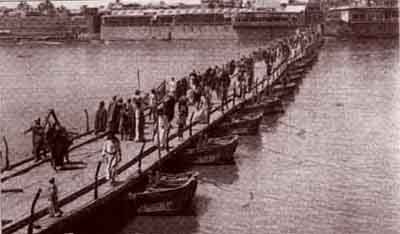 أحدى الجسور التي كانت تتوسط نهر دجله عام 1920م Y_ou_o10