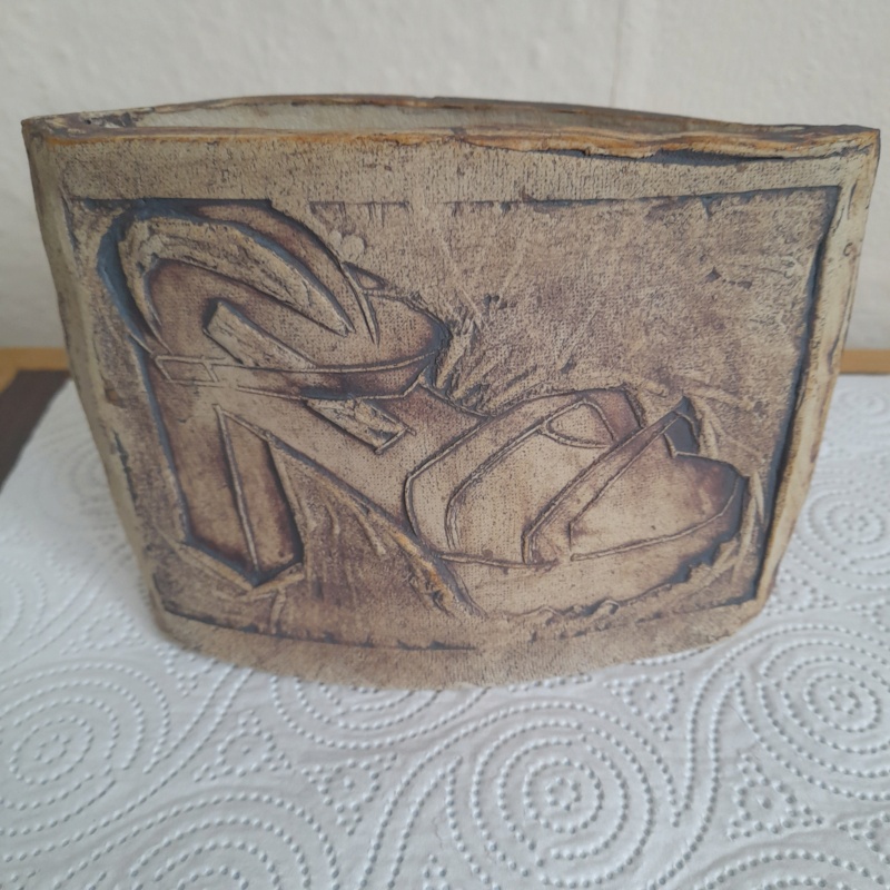 Slab built 20th century pot with shoe motifs  20220514