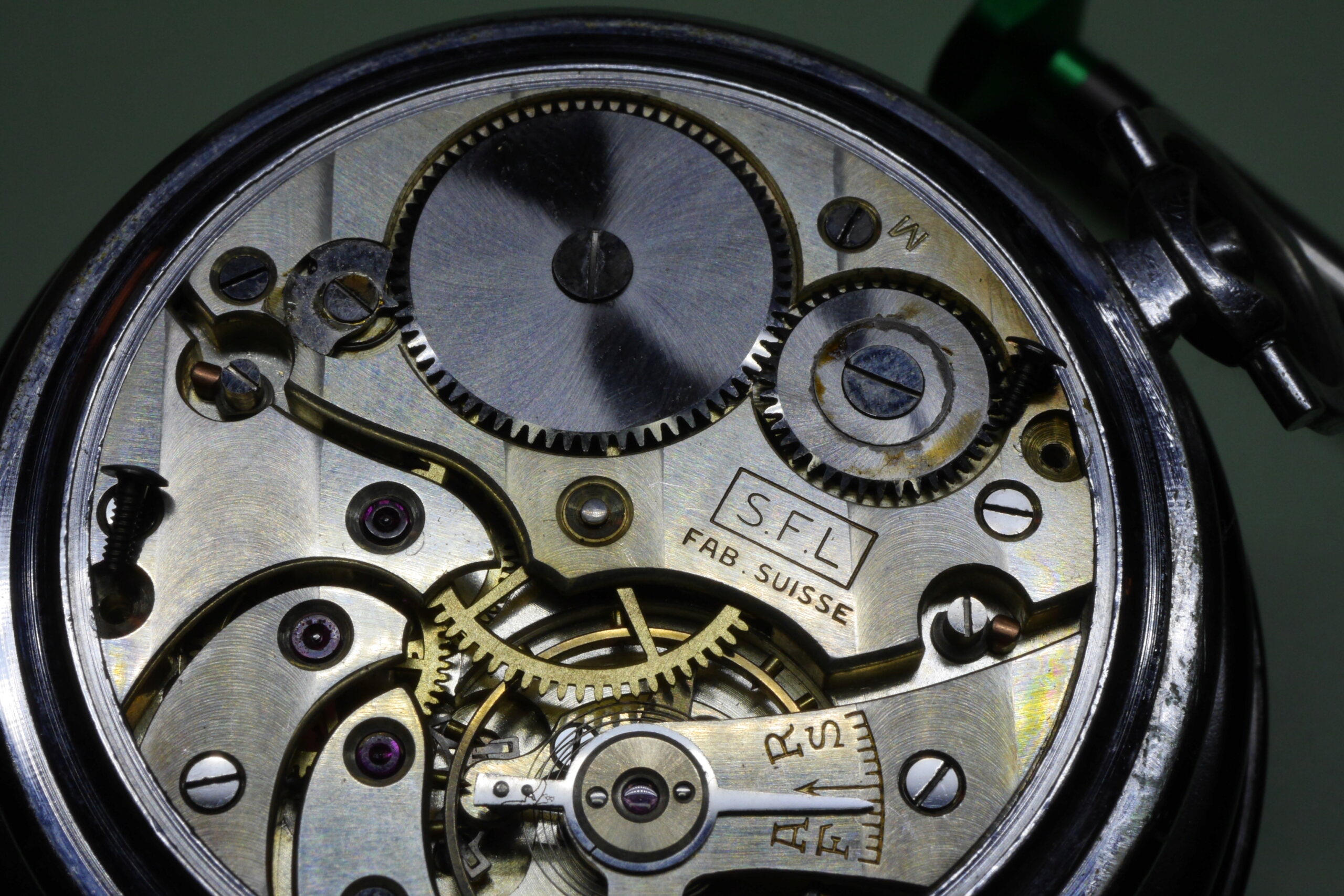 Réparation et entretien d'une montre de poche S.F.L (société française longines) 2010