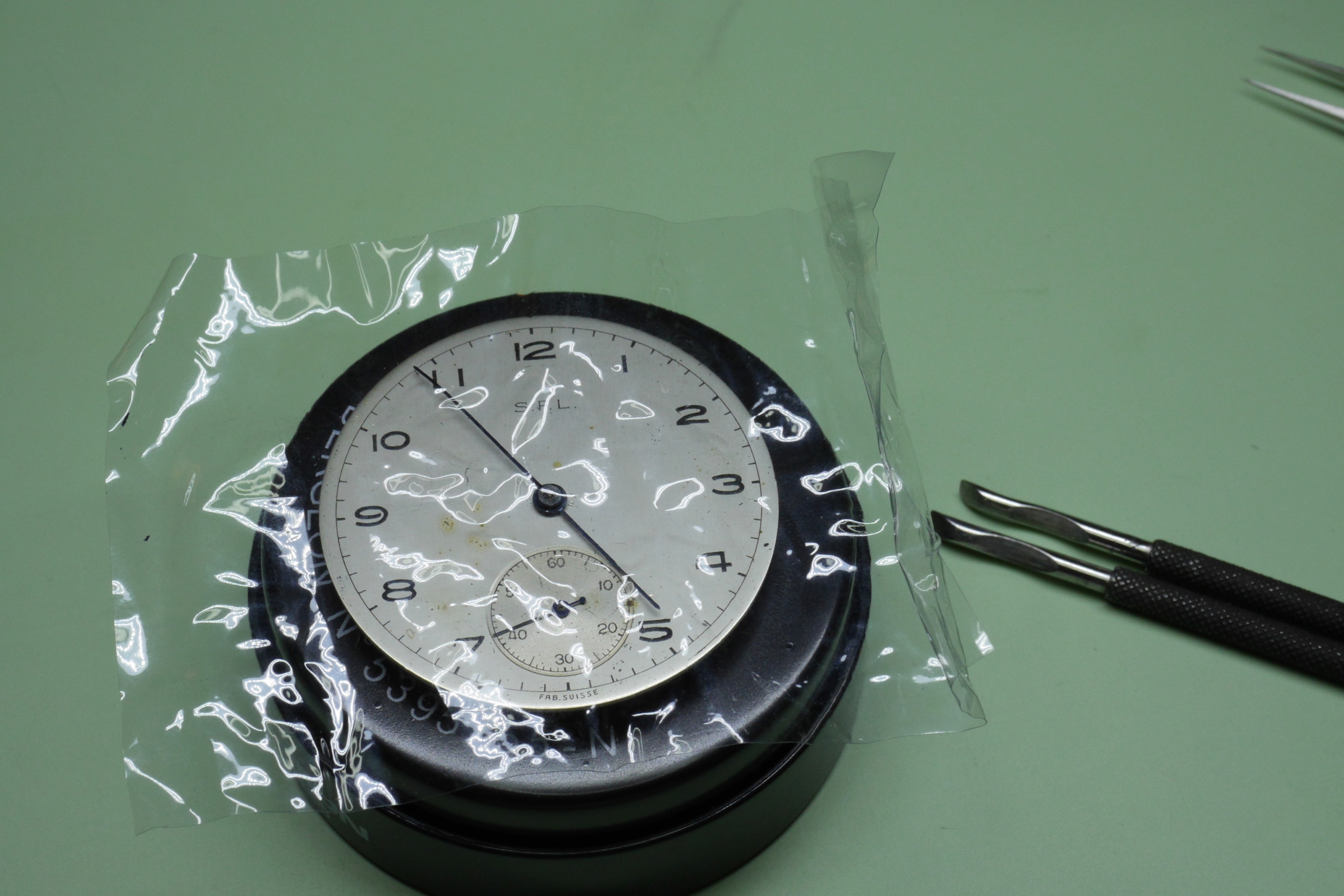 Réparation et entretien d'une montre de poche S.F.L (société française longines) 2810
