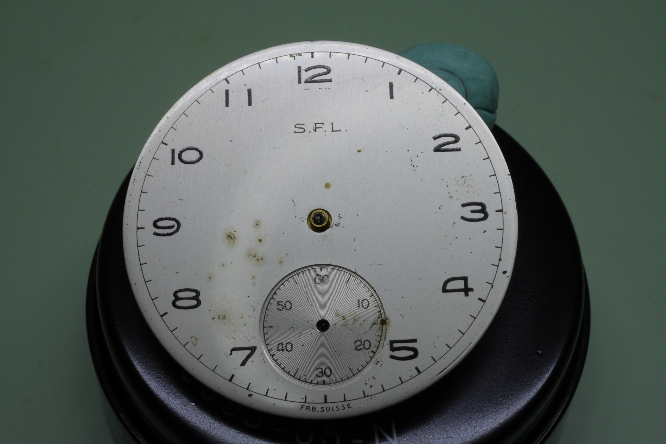 Réparation et entretien d'une montre de poche S.F.L (société française longines) 3010