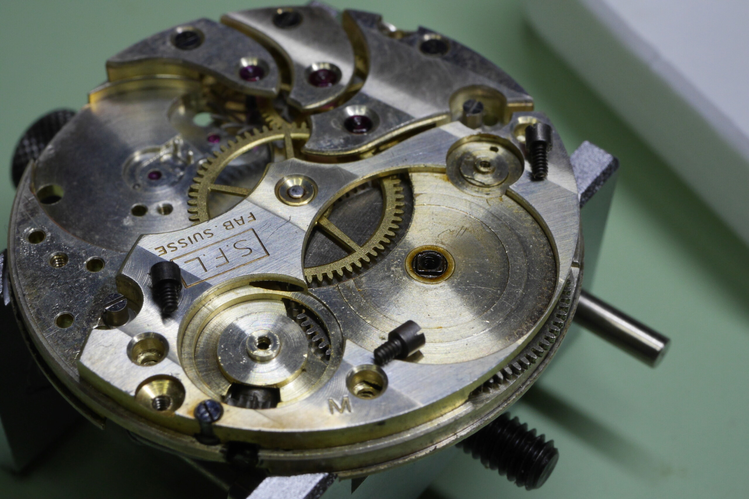Réparation et entretien d'une montre de poche S.F.L (société française longines) 4210