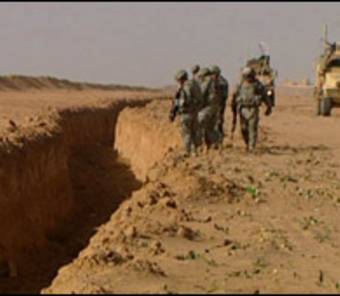 العراق ينجز حفر خندق حدودي مع سورية لمنع عبور المسلحين 12617310