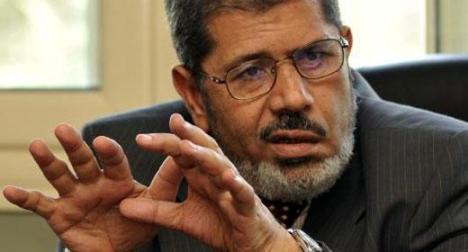 الاخوان تهدد " المفتي " : اعدام مرسي لن يمر دون عقاب D985d810