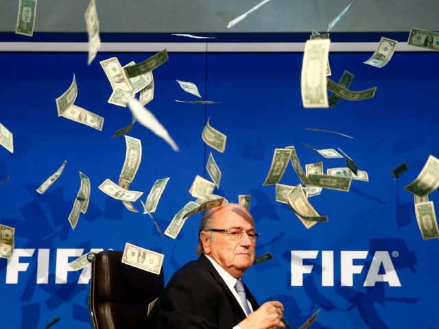 Sepp Blatter has money thrown at him A-prot10