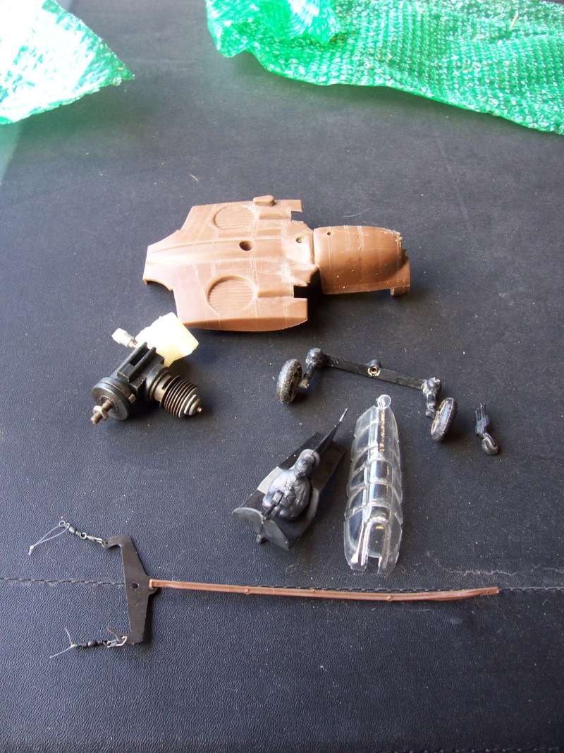 My P-40 gets some parts. 100_4615