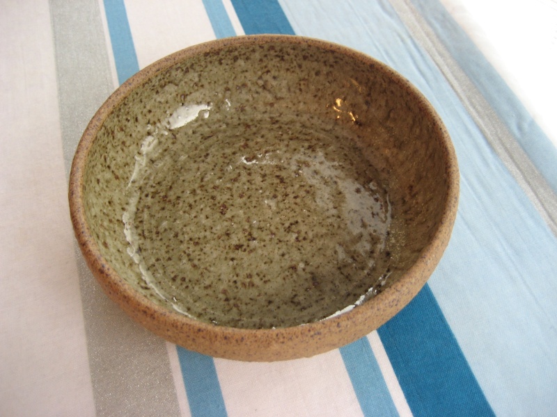  Stoneware dish, green glaze inside, mark =incised 3 arm swirl and grey dot Img_0340