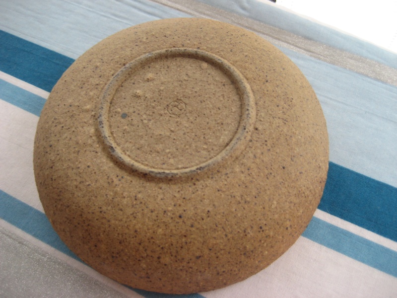  Stoneware dish, green glaze inside, mark =incised 3 arm swirl and grey dot Img_0342