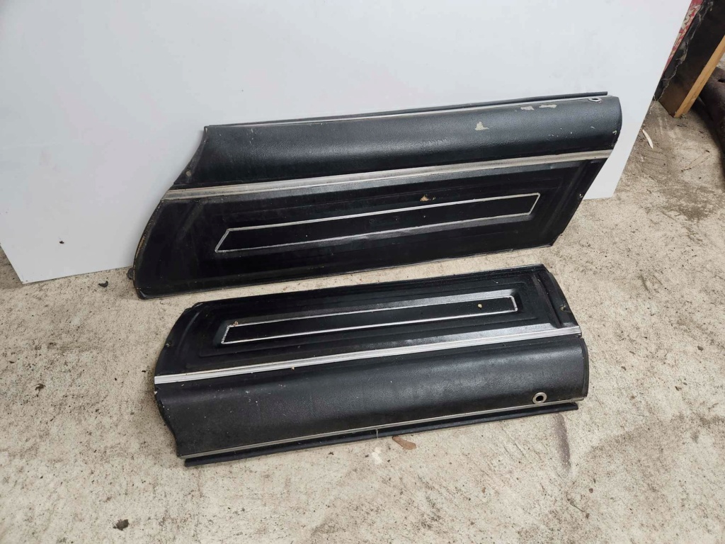looking for two parts passenger side wheel well trim sedan door panels base style 36675012