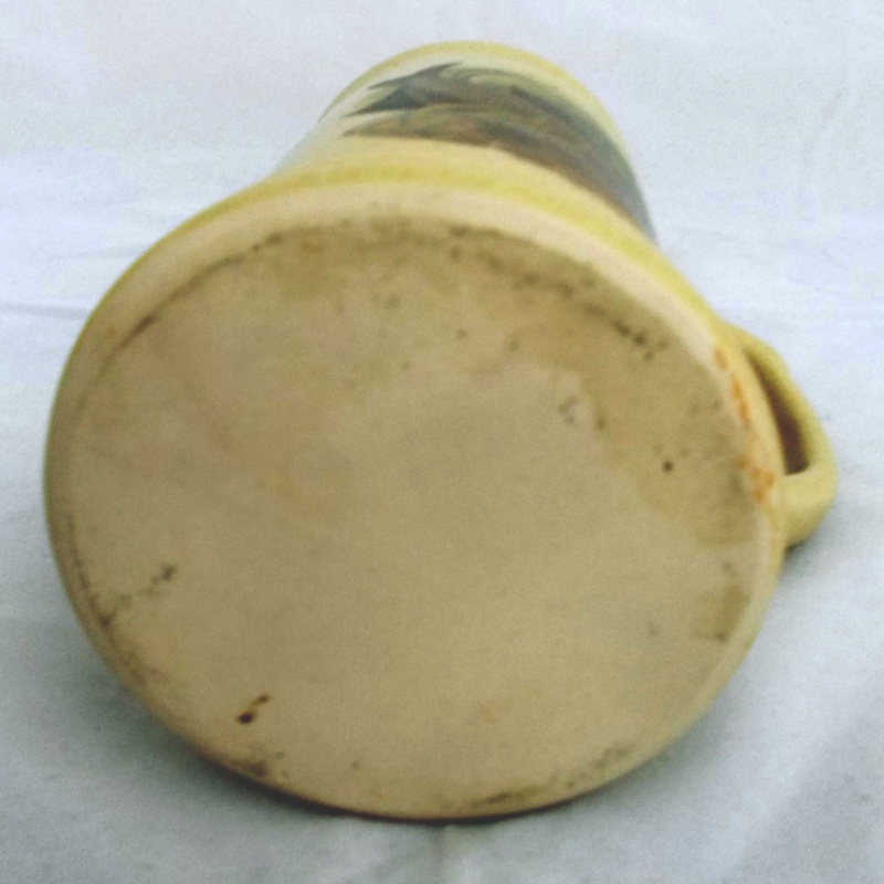 Who made this beige tankard with fish picture? Dscn6824