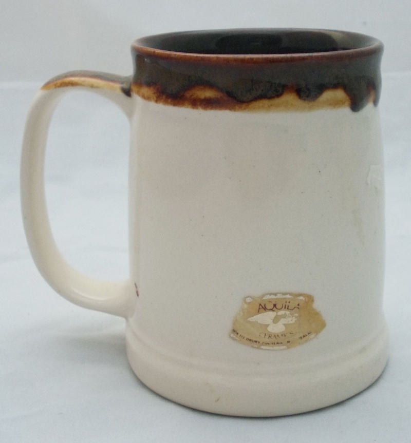 Who made this beige tankard with fish picture? Dscn6921