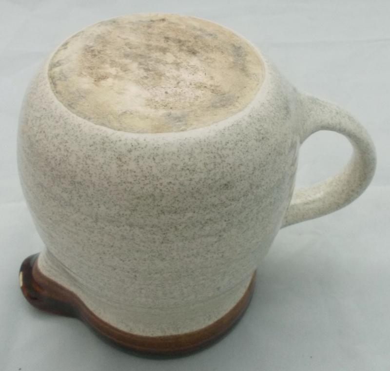 Who made this beige tankard with fish picture? Dscn6925