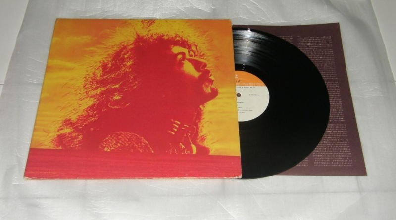 Santana with poster LP used Santan13