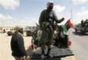 الثوار الليبيون يصدون هجومين للقوات الموالية للقذافى Ouousu11