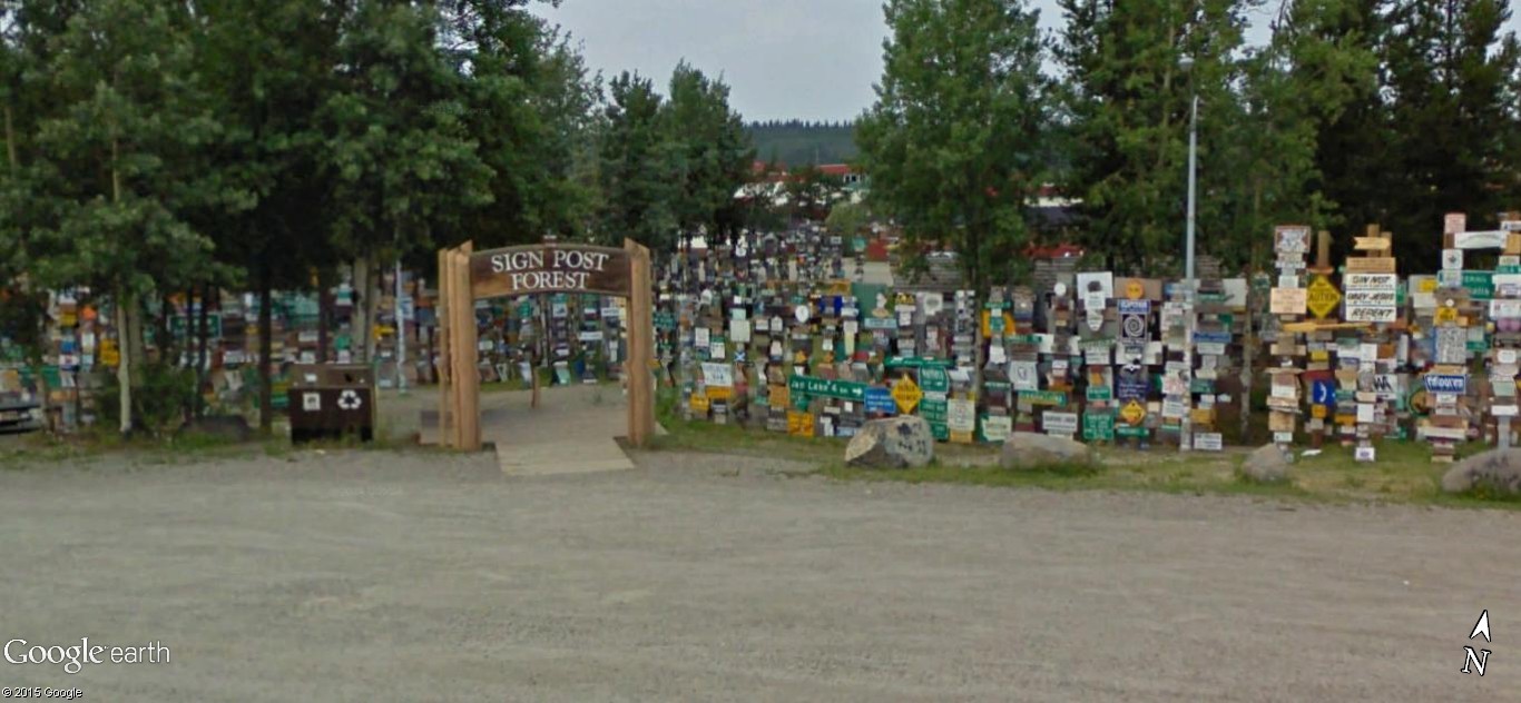 STREET VIEW : une forêt de panneaux de direction, SIGN POST FOREST, YT, Canada A13