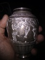 Vase argent motifs orientaux. 110