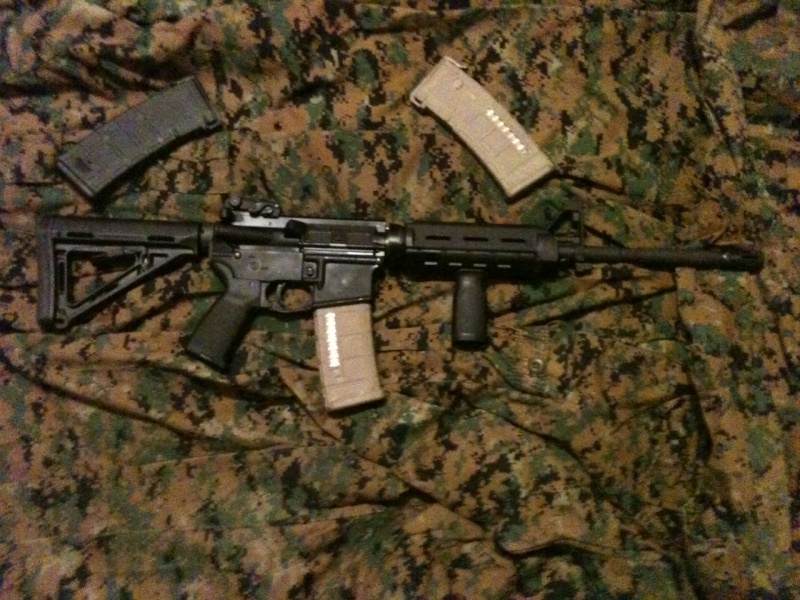 Got a new toy - Bushmaster AR-15 w/ Magpul goodies. Photo210