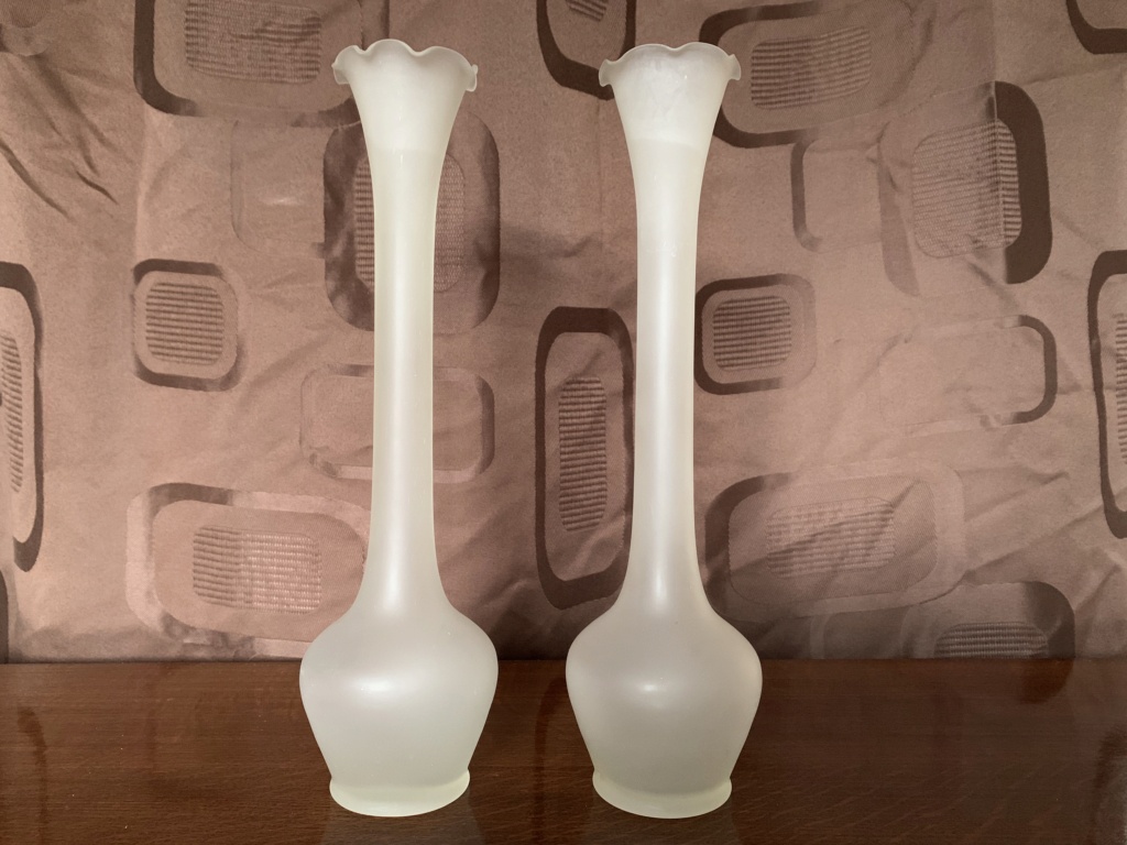 A pair of tall, frosted glass vases 1d4f1010