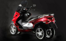 Quadro : Un scooter à 4 roues présenté à Milan  - Page 3 02_qua10