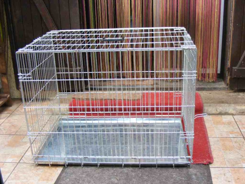 A Vendre cage métallique pliable.Réservée Dscf0410