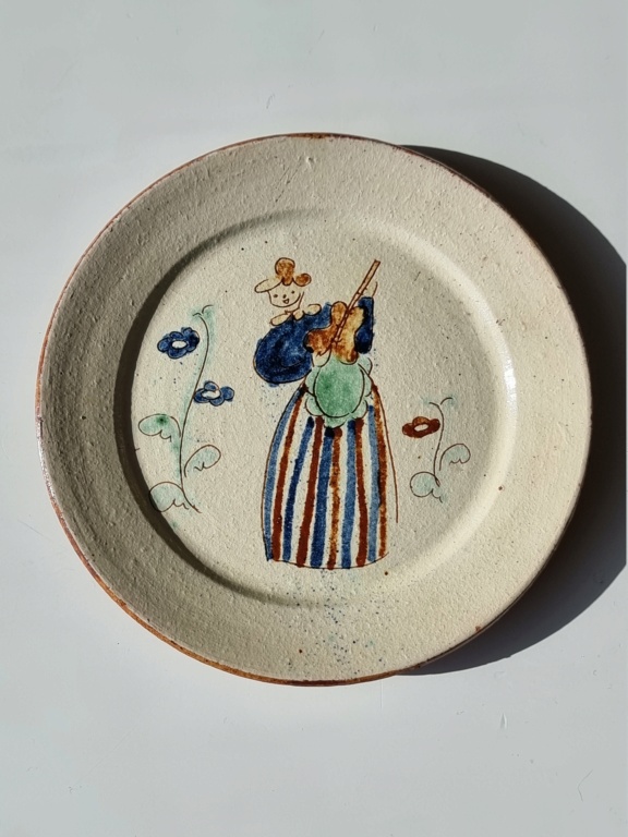 Hello, I need help to identify these ceramic plates 20240311