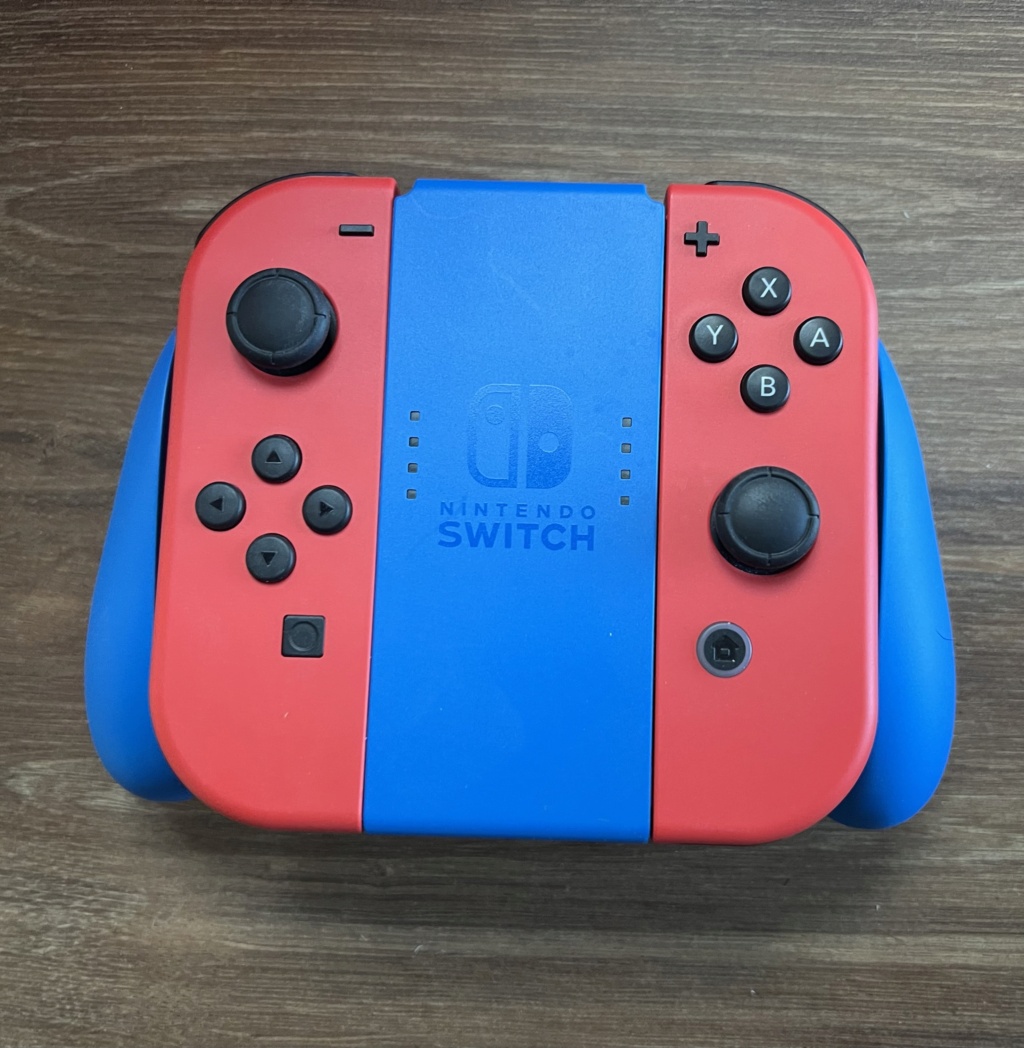 [VENDS] Nintendo Switch - Edition Mario Rouge & Bleue E5a6fa10