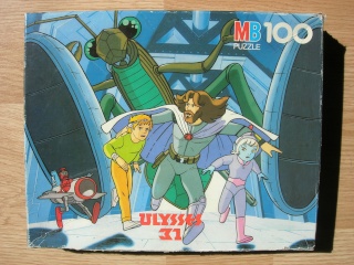 Les puzzles 80's de D.A, séries ou de  gamme de jouets.... Ulysse10