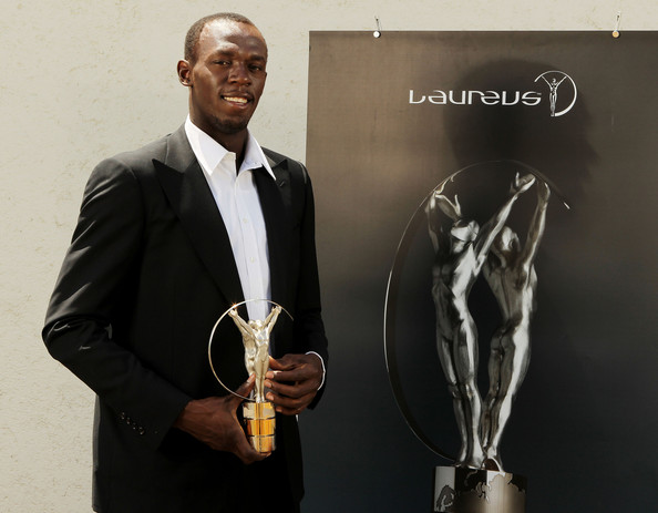 Usain Bolt and Friends I just couldnt help it as Im a big fan and these pics of him are cute! Awards10