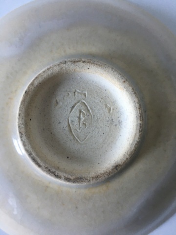 Small footed trinket dish. Oak leaf dec. Impressed mark.Trying to ID B8178410