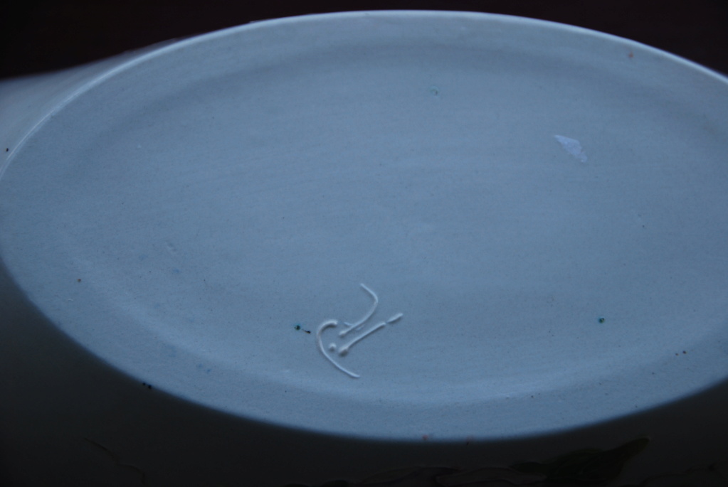 Hand painted elongated dish with tube lined decoration, Signed R Dsc_0114