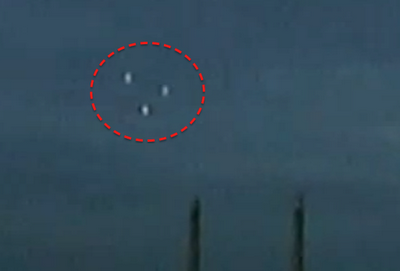 UFOs fly in formation over East London, UK power plant 661410
