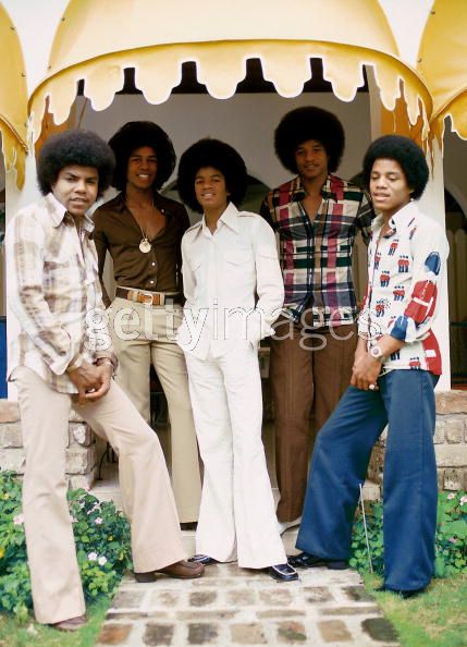 Michael Jackson and Bob Marley sitting under a tree in Jamaica 85003210