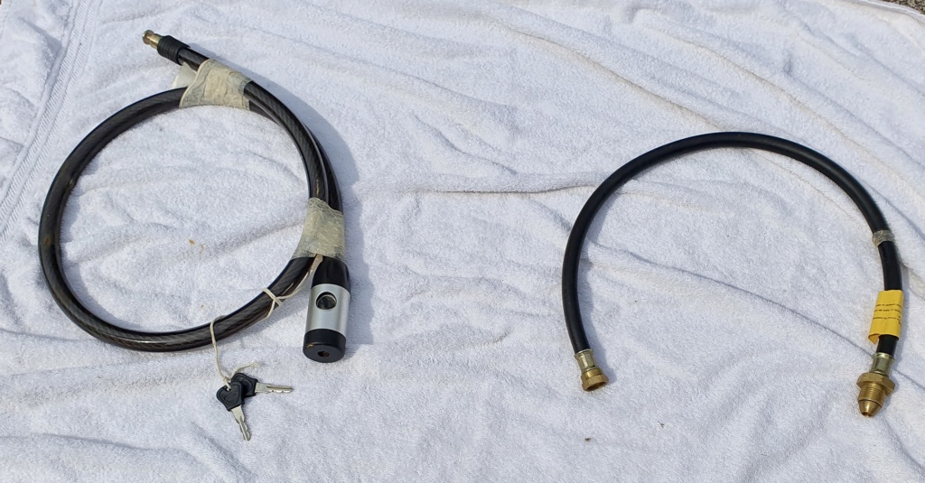 Locking cable/gas hose for sale. + freebies. 55334c10