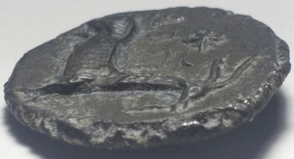 Ayuda para identificar esta moneda 315