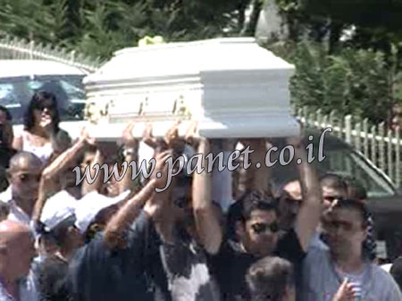 مراسيم دفن رامي الشمالي /صور رامي الشمالي داخل الثابوت عند مراسم الدفن  Rami2910
