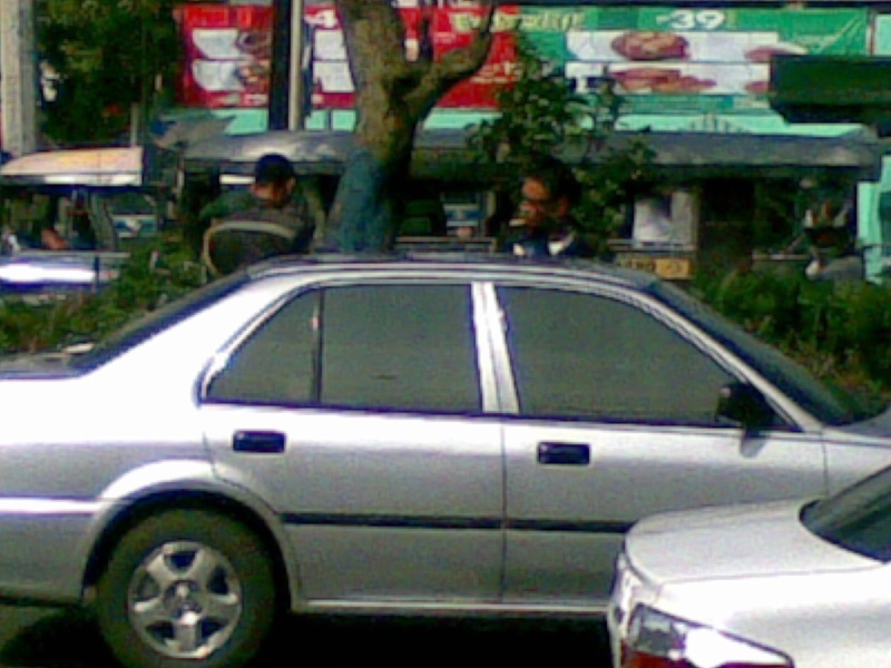 MMDA Officers abusing a citizen after making a road violation 07102011