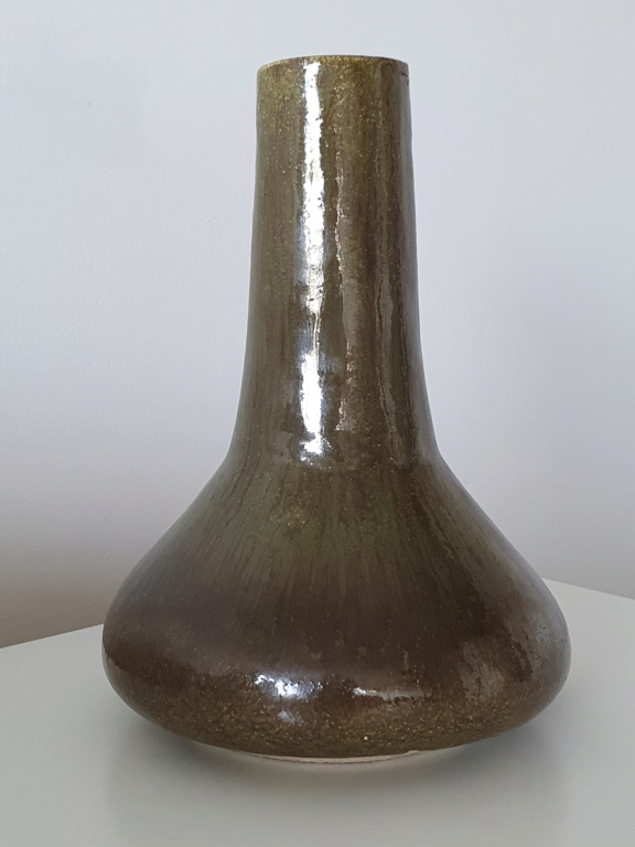 Green glazed vase with acronym DES on bottom 20220422