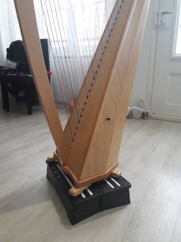 Réhausseur pliable pour harpe