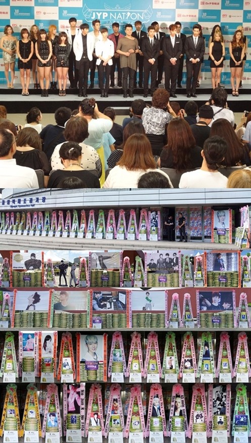 [07.08.12] Les fans des 2PM, 2AM et Wonder Girls font don de 7 tonnes de riz aux enfants souffrant de malnutrition pour le JYP Nation 26945-10