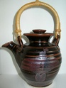 Teapot with cane handle and signature - unusual splayed spout Dscn5510