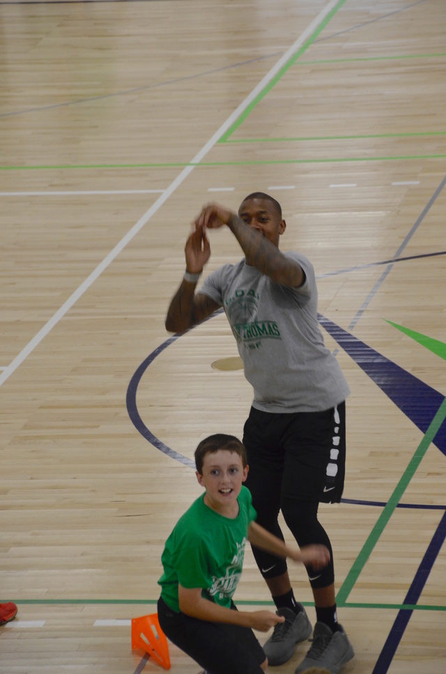 "Hey dad, I'm going to camp with a Celtic!"  Isaiah Thomas and my son. _dsc0013