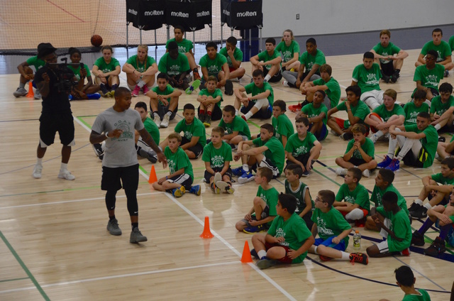 "Hey dad, I'm going to camp with a Celtic!"  Isaiah Thomas and my son. _dsc0111