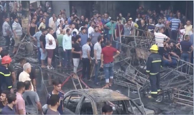 131 قتيلاً بتفجيرين في بغداد و 200 جريح وفيديو طرد العبادي بالأحذية من المكان 2513