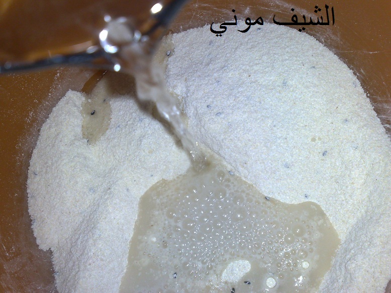 خبز الدار الجزائري بالسميد من مطبخ الشيف موني بالصور 312