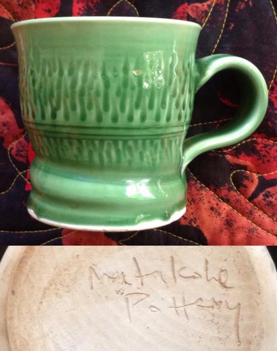a mug with Dave Wolland's "Matakohe Pottery" mark Matako10