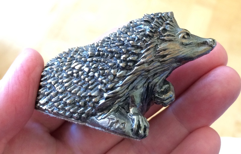 Metal hedgehog figurine Image165