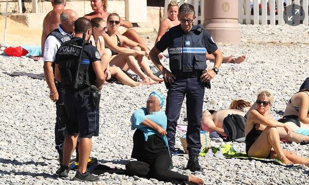 Armed French Police Confront Burkini Wearing Woman Captur35