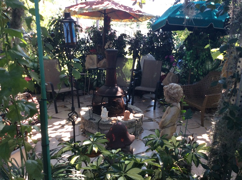 The latest incarnation of my yard sale garden/patio/courtyard Patio110