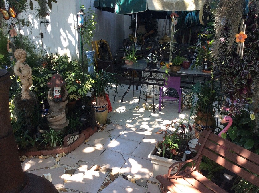 The latest incarnation of my yard sale garden/patio/courtyard Patio710